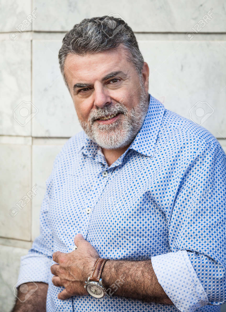 files/38465982-attractive-man-50-years-old-with-beard-and-hat.jpg
